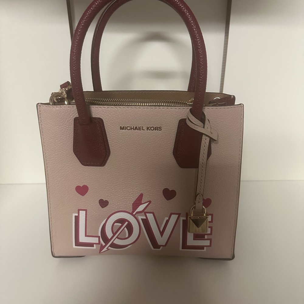 Michael Kors small Messenger Leather Bag….